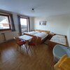 Photo of triple room with running hot/cold water
