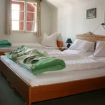 Photo of triple room with running hot/cold water